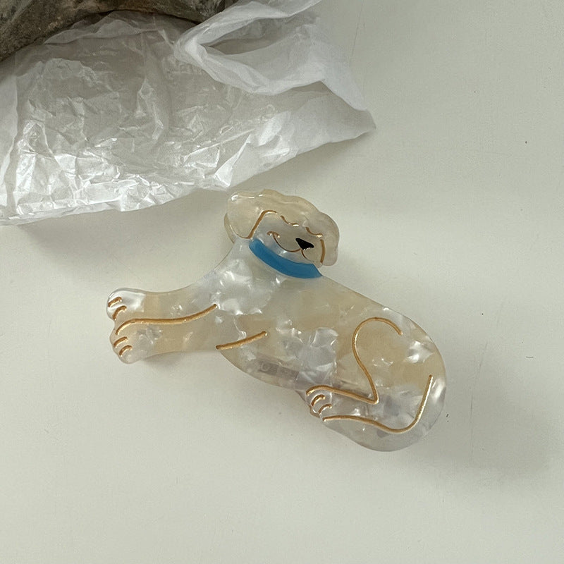 Griffe de chiot à texture de coquillage