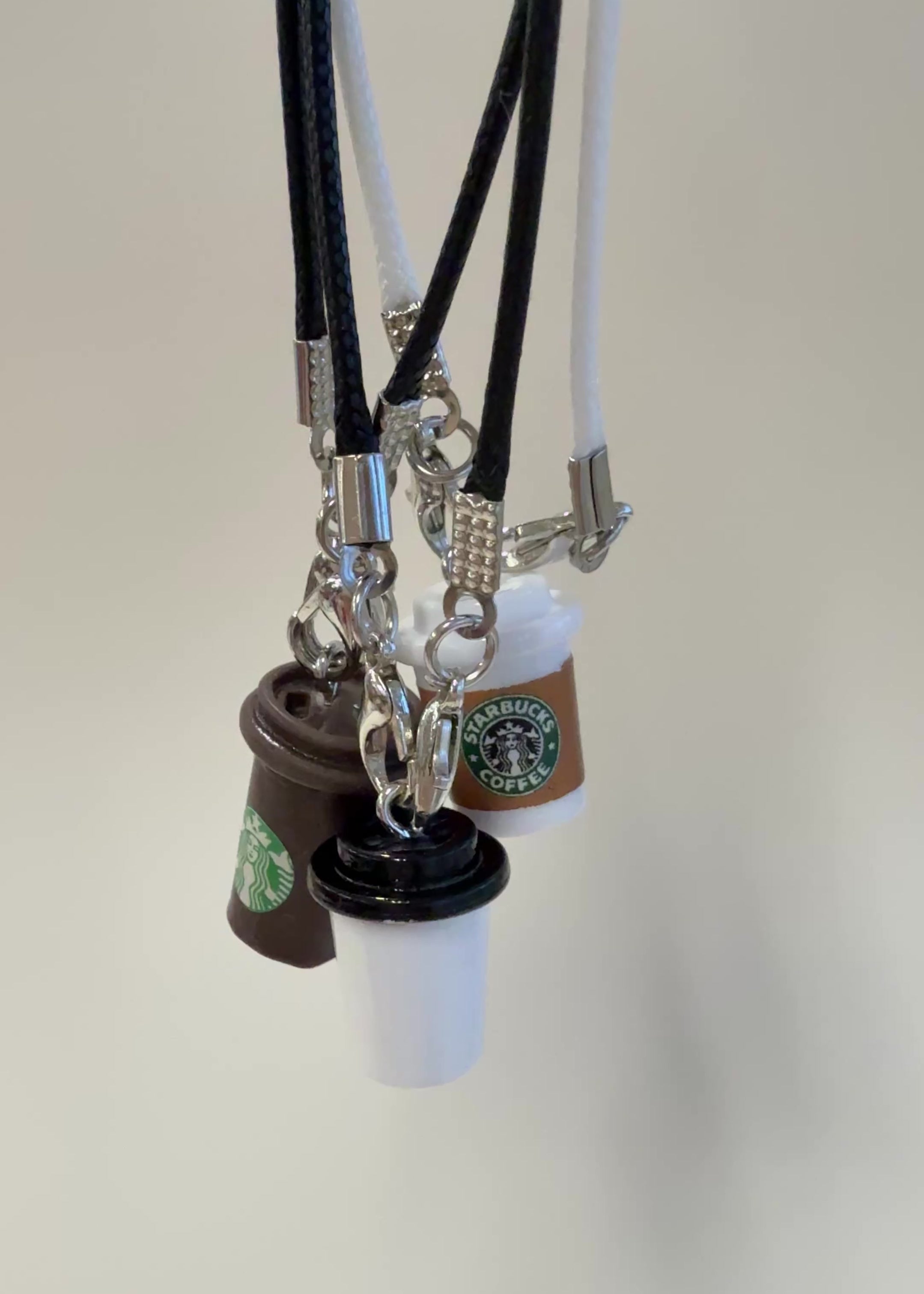 Starbucks keychain on a white background
Labubu accessories
Labubu Starbucks accessories