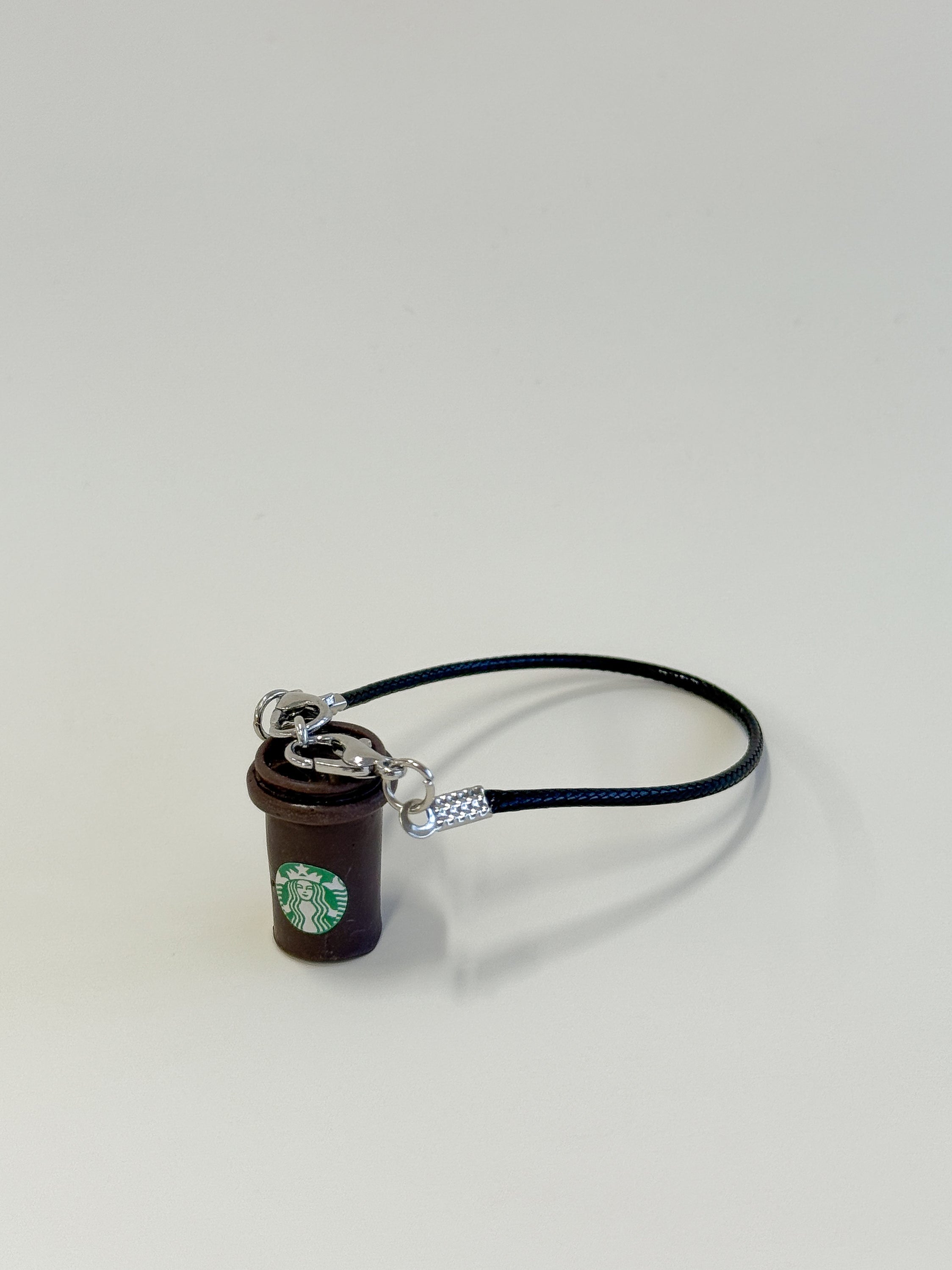 Starbucks keychain on a white background
Labubu accessories
Labubu Starbucks accessories